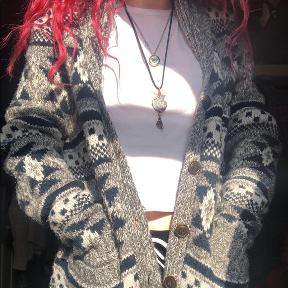 Blue, white, and gray sweater.